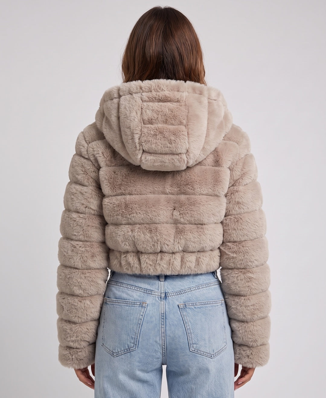 Women's cropped faux fur hooded bomber jacket in beige, back view