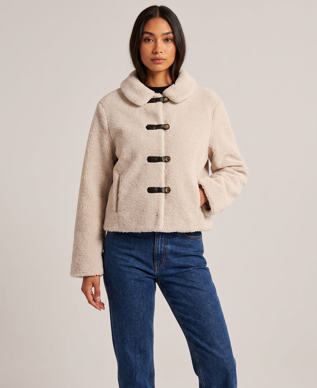 Women's cropped teddy jacket with toggle fastening in beige, front view