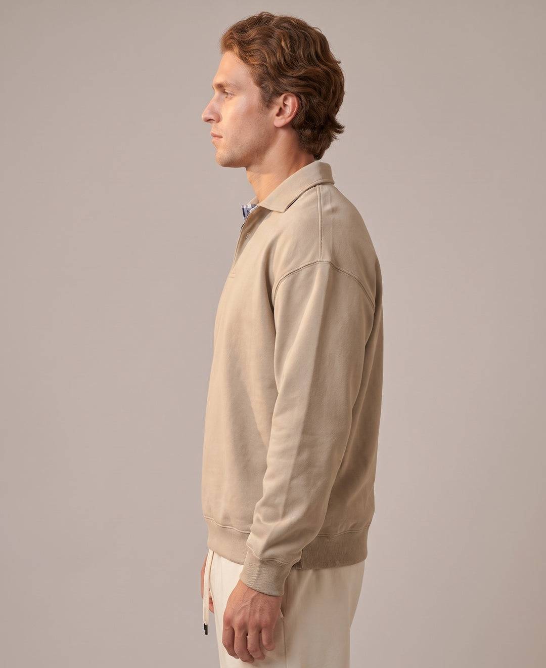 Men's beige collared sweatshirt, side view
