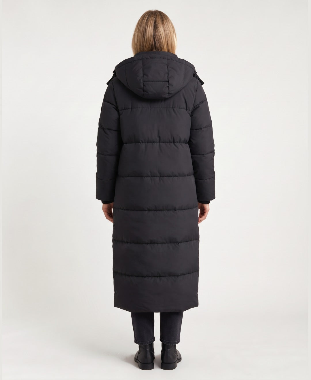 Women's long hooded puffer coat black back view