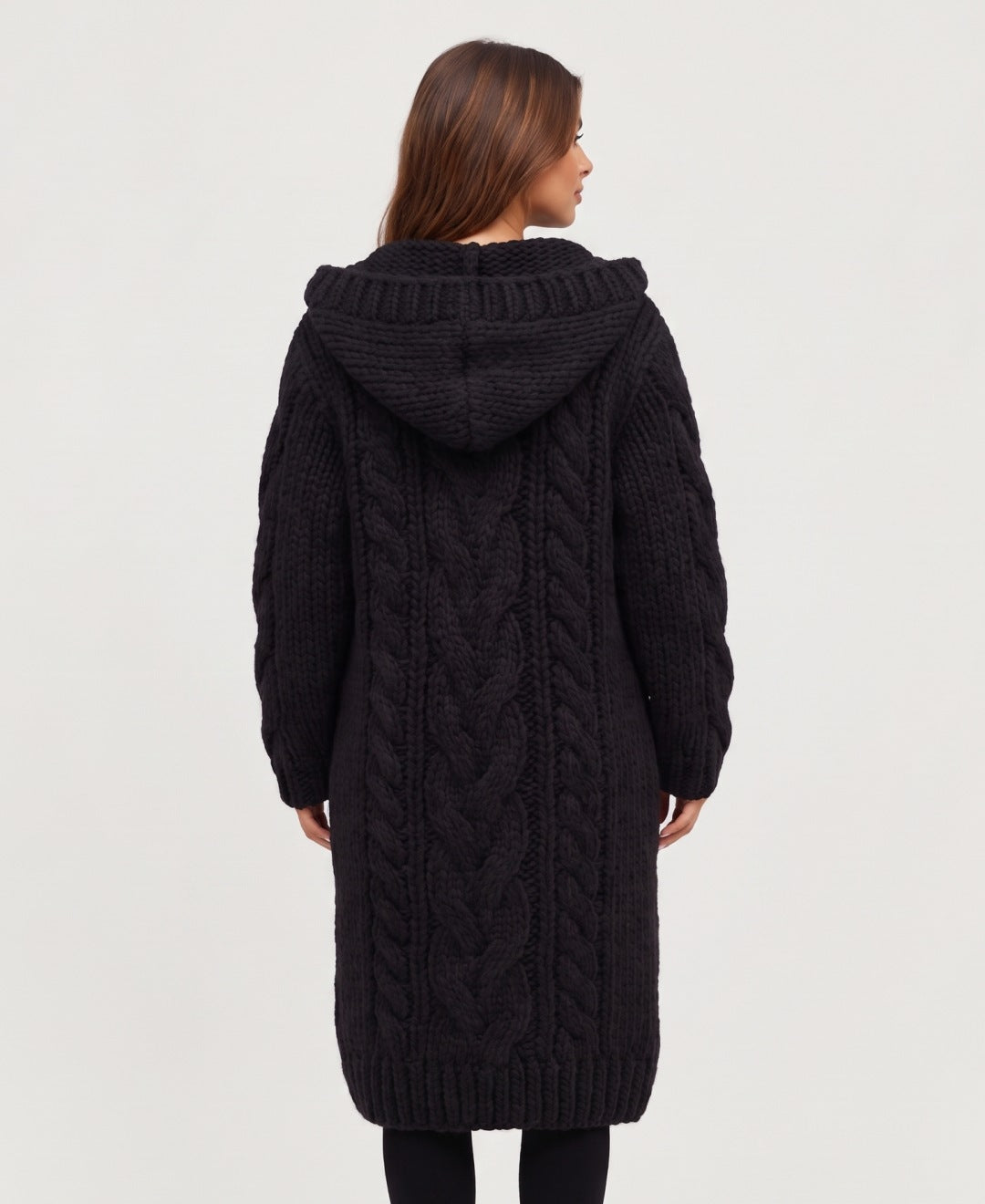 Women's long chunky cable knit hooded cardigan in black, back view