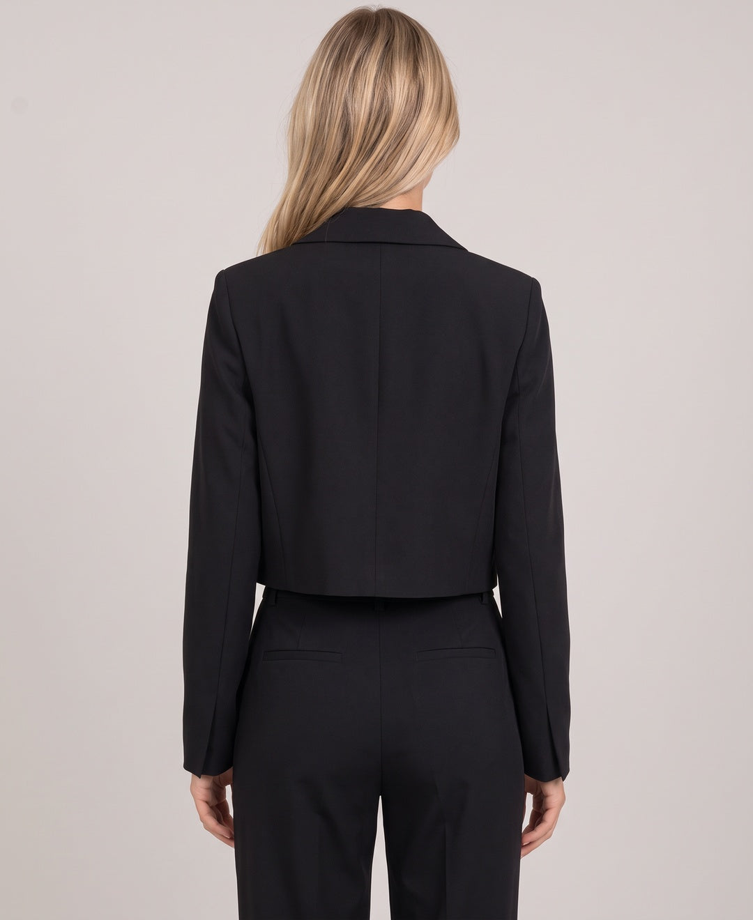 Women's cropped blazer in black, back view