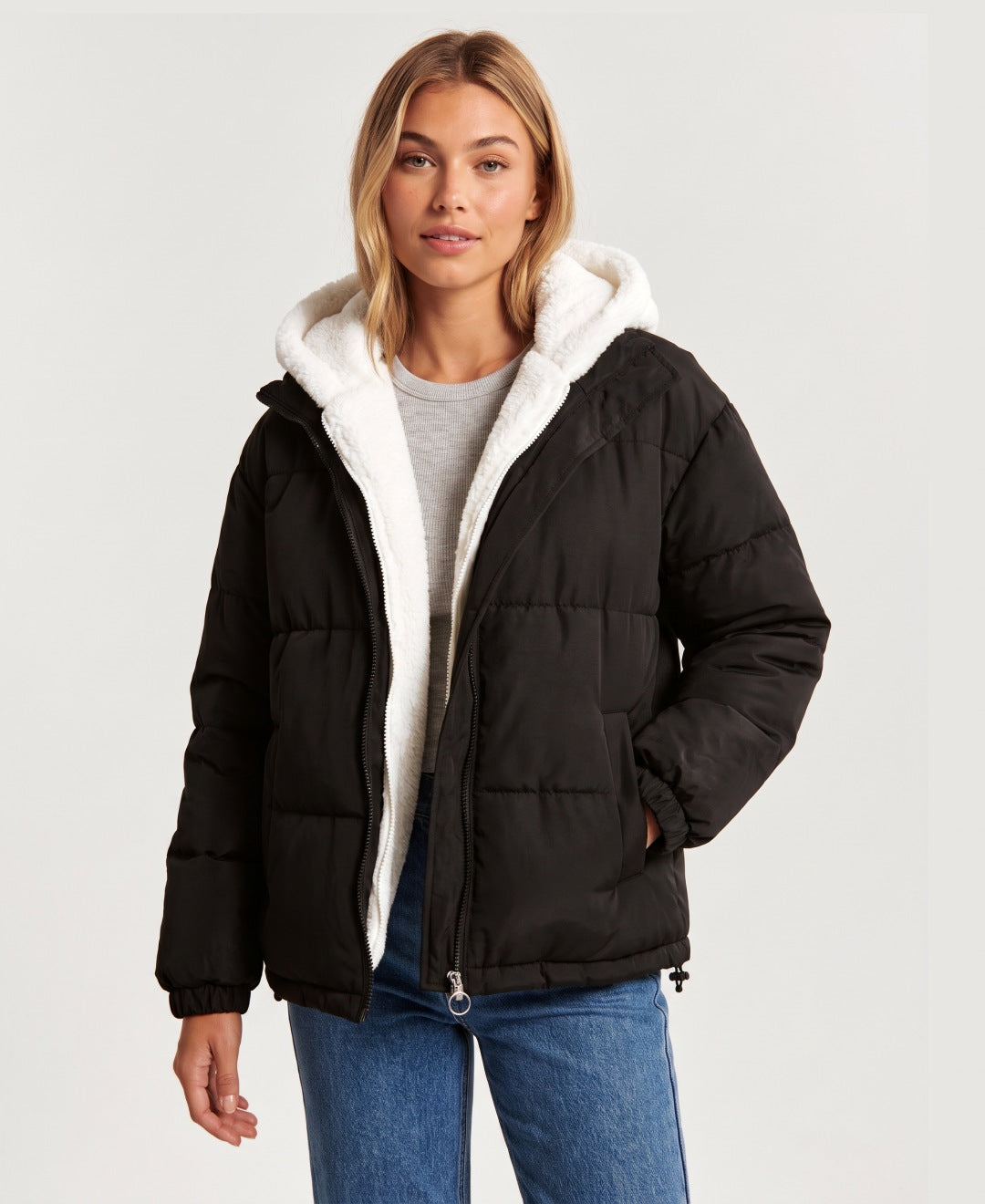 Women's hooded puffer jacket with sherpa fleece hood in black, front view