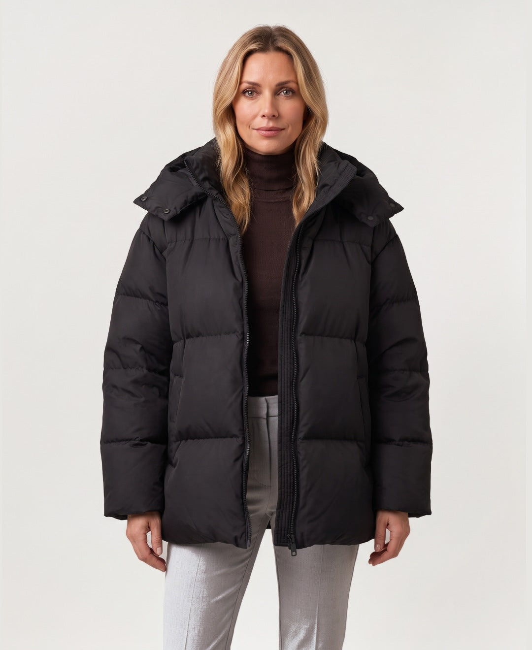 Women's oversized hooded puffer jacket black front view
