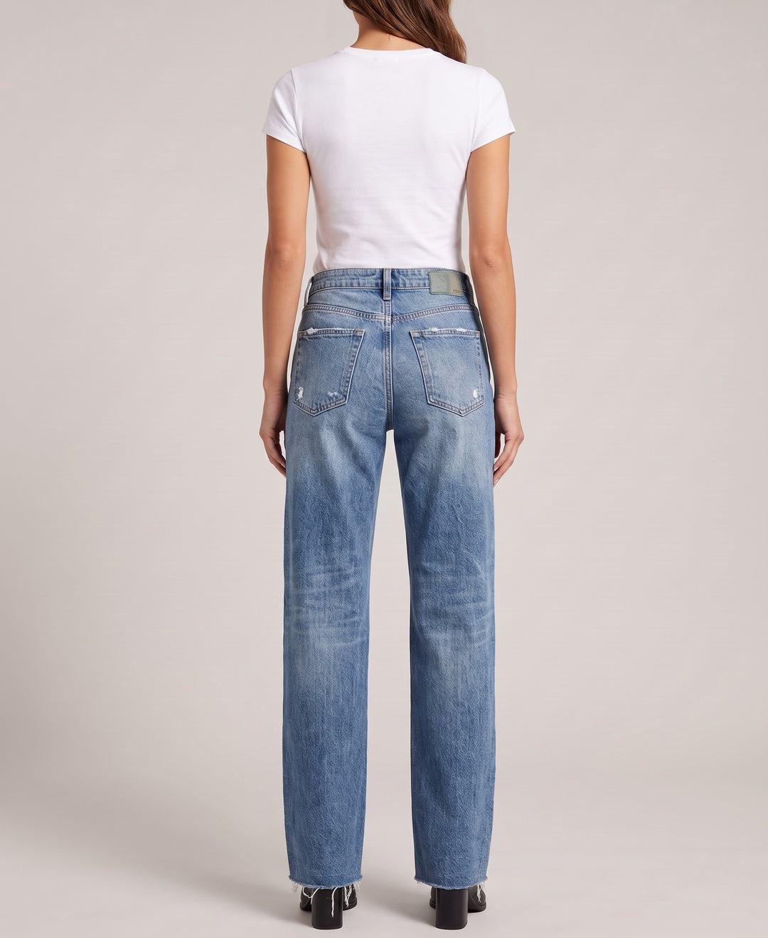 Women's wide leg ripped jeans in blue, back view