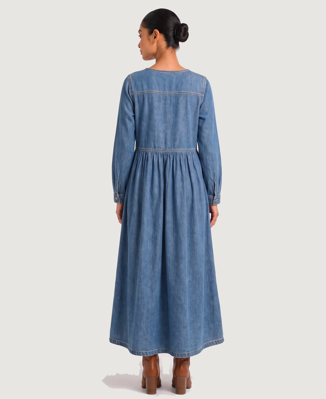 Women's long sleeve denim maxi dress in blue, back view