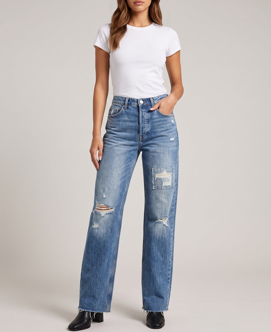 Women's wide leg ripped jeans in blue, front view