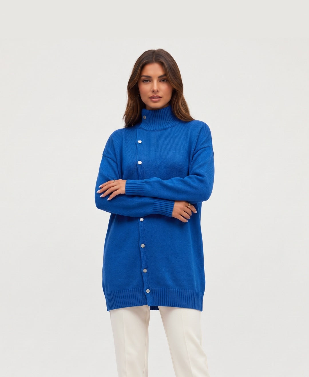 Women's longline roll neck jumper with asymmetric buttons in blue, front view