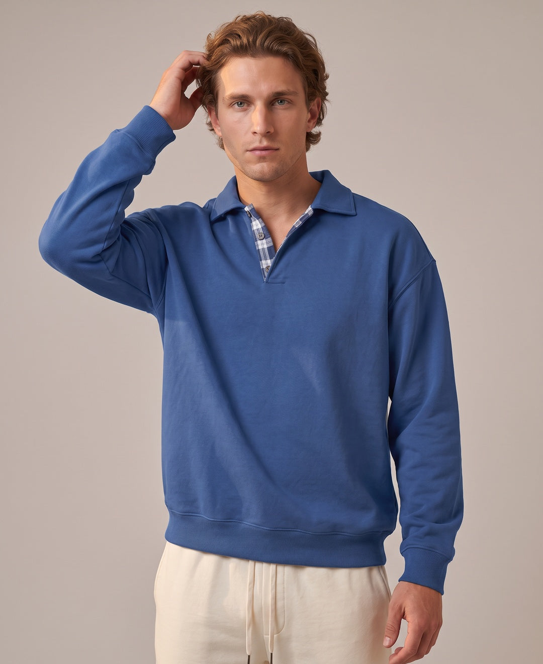 Men's blue collared sweatshirt, front view