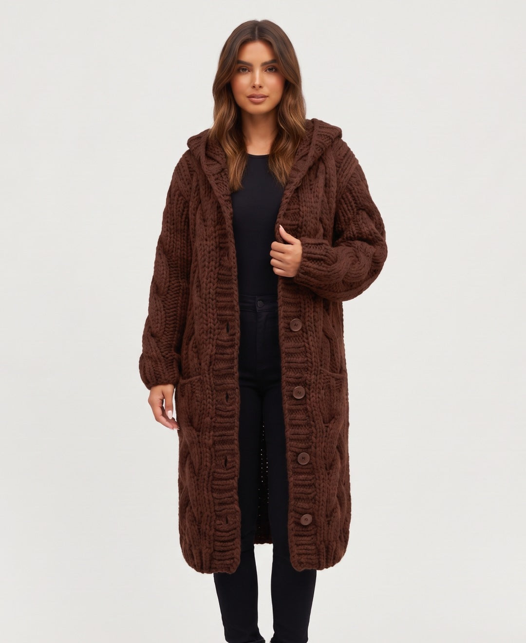 Women's long chunky cable knit hooded cardigan in brown, front view