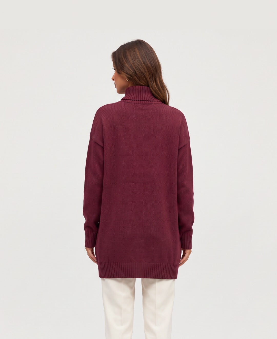 Women's longline roll neck jumper with asymmetric buttons in burgundy, back view