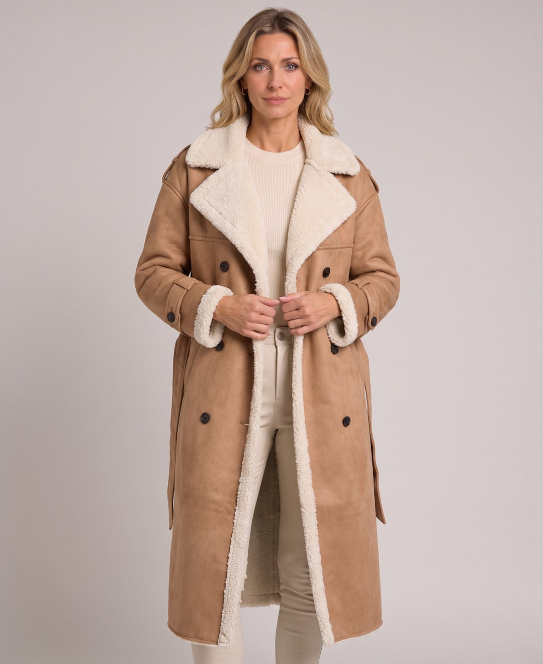 Camel long coat with teddy lining, front view on model