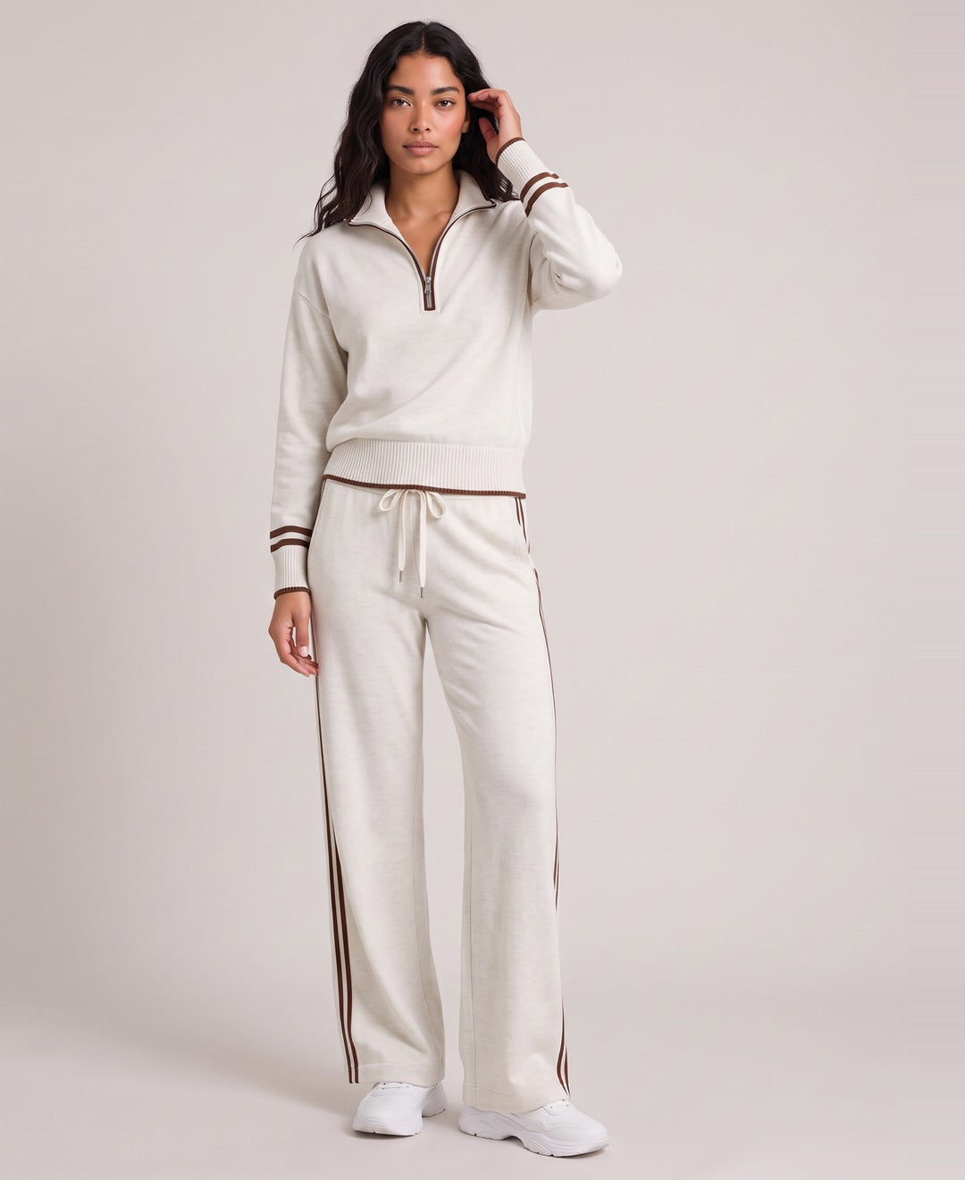 Cream striped half zip knit set front view on model