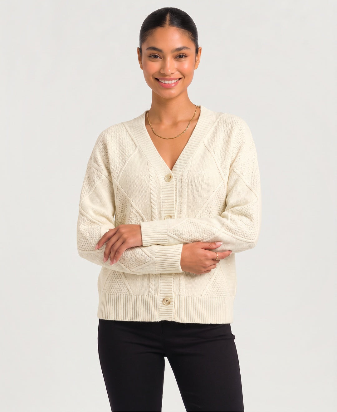 Women's diamond cable knit V-neck button cardigan in cream, front view