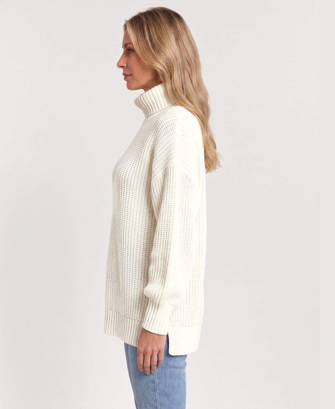 Women's chunky rib knit roll neck jumper cream side view