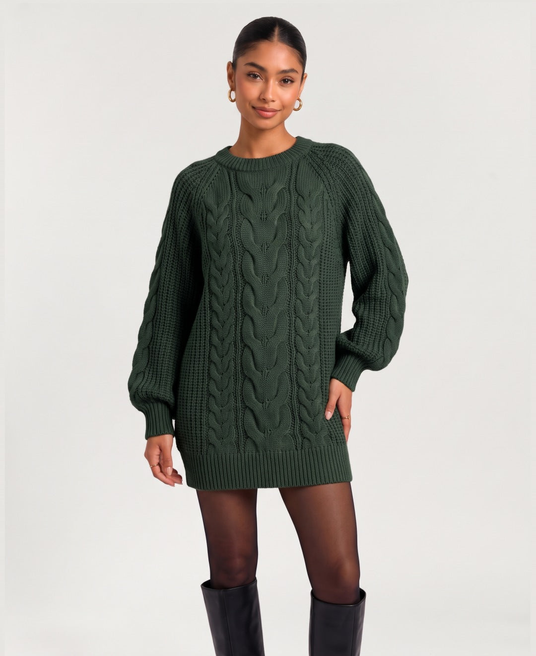 Women's chunky cable knit jumper dress in dark green, front view