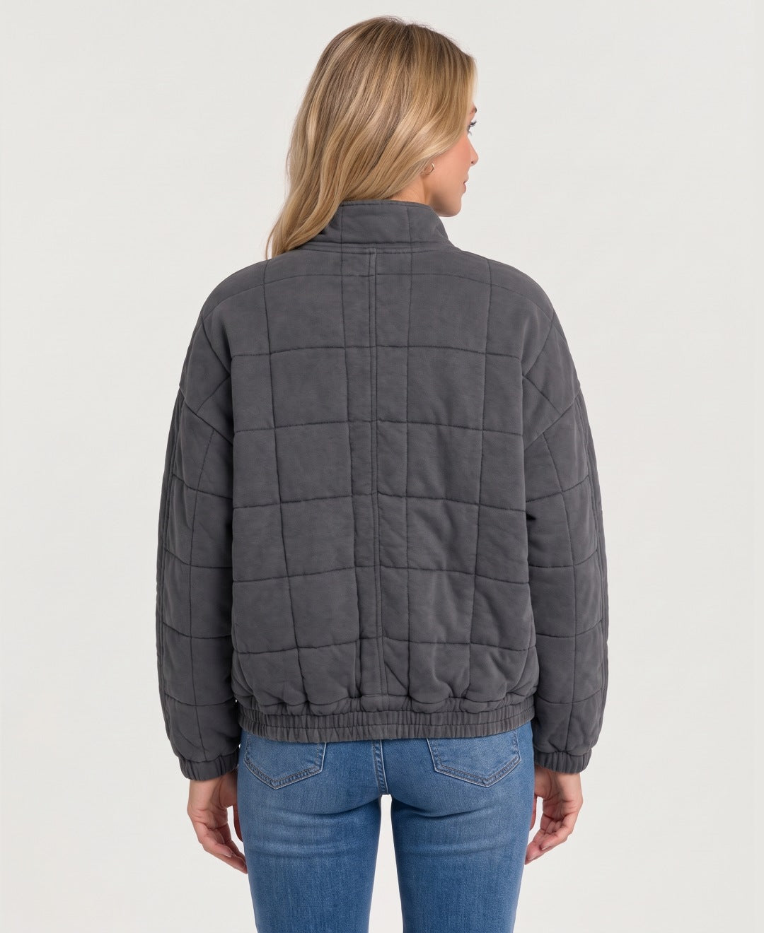 Women's quilted zip-up jacket dark grey back view