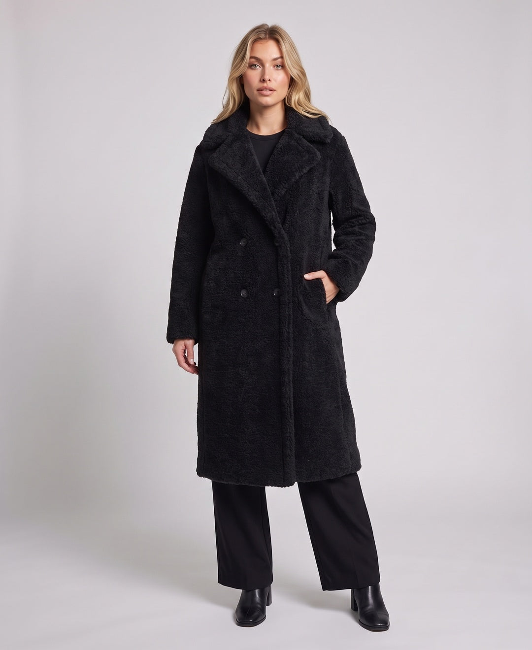 Women's teddy faux fur longline coat in black, front view