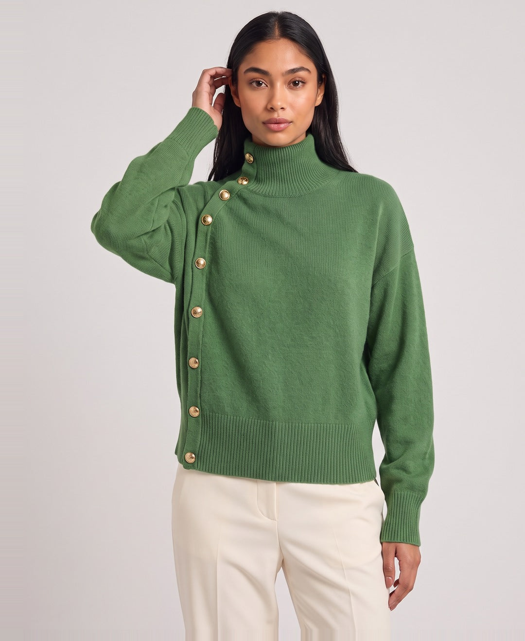 Green roll neck jumper front view on model