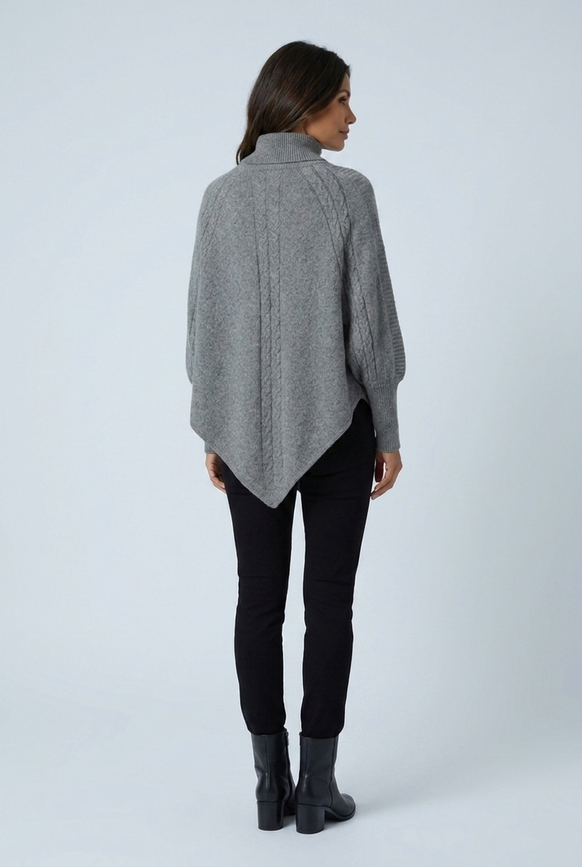 Grey cable knit turtleneck poncho back