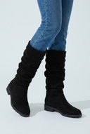 Black slouchy suede-look knee high boots closeup