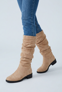 Apricot slouchy suede-look knee high boots closeup