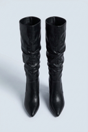 Black pointed toe block heel knee high boots front