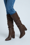 Brown pointed toe block heel knee high boots closeup