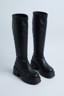 Black chunky lug sole knee high boots front