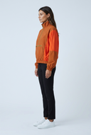 Orange colourblock half-zip windbreaker jacket side