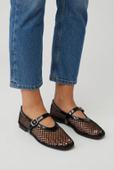 Black fishnet mesh mary jane ballet flats closeup
