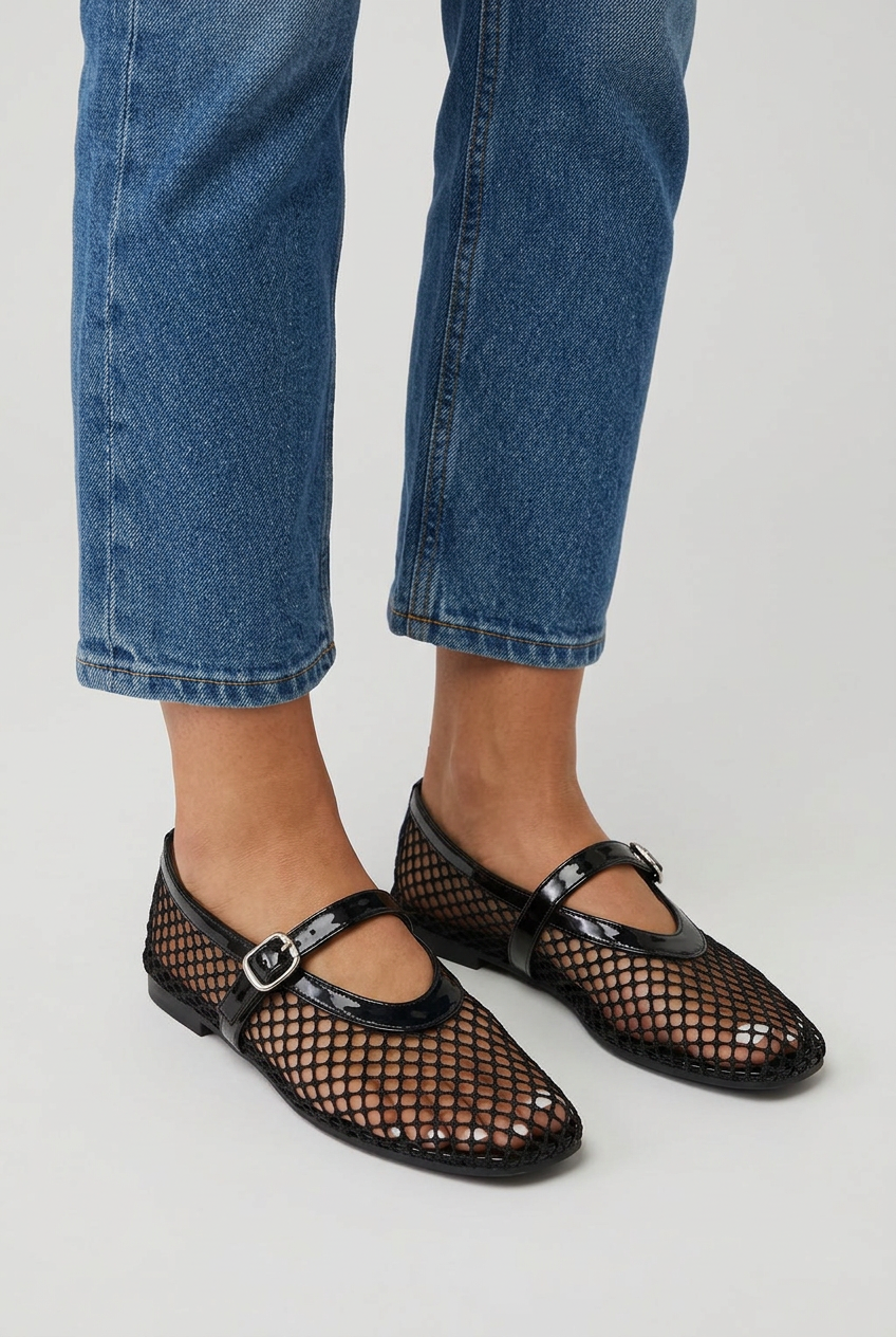 Black fishnet mesh mary jane ballet flats closeup