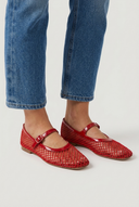 Red fishnet mesh mary jane ballet flats closeup
