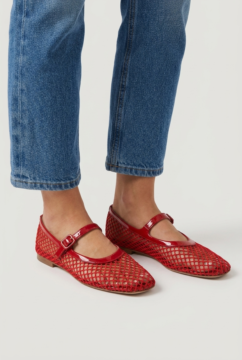 Red fishnet mesh mary jane ballet flats closeup