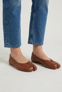 Brown leather split toe tabi ballet flats closeup