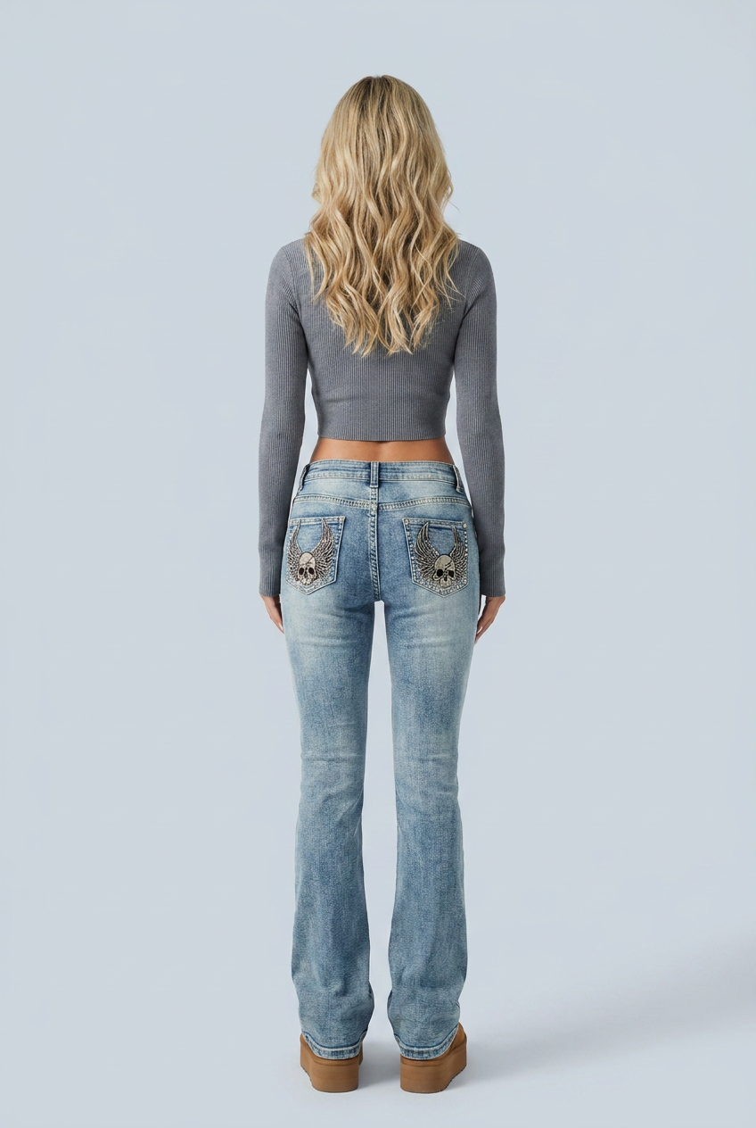 Light Wash skull wings back pocket low rise flare jeans back