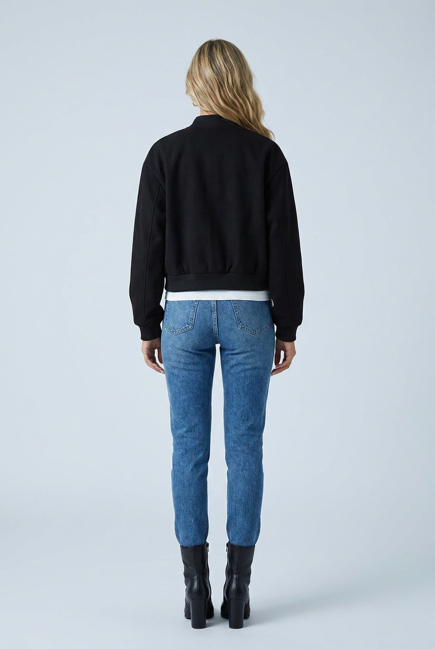 Black bomber jacket ribbed trim snap button front flap pockets cropped back