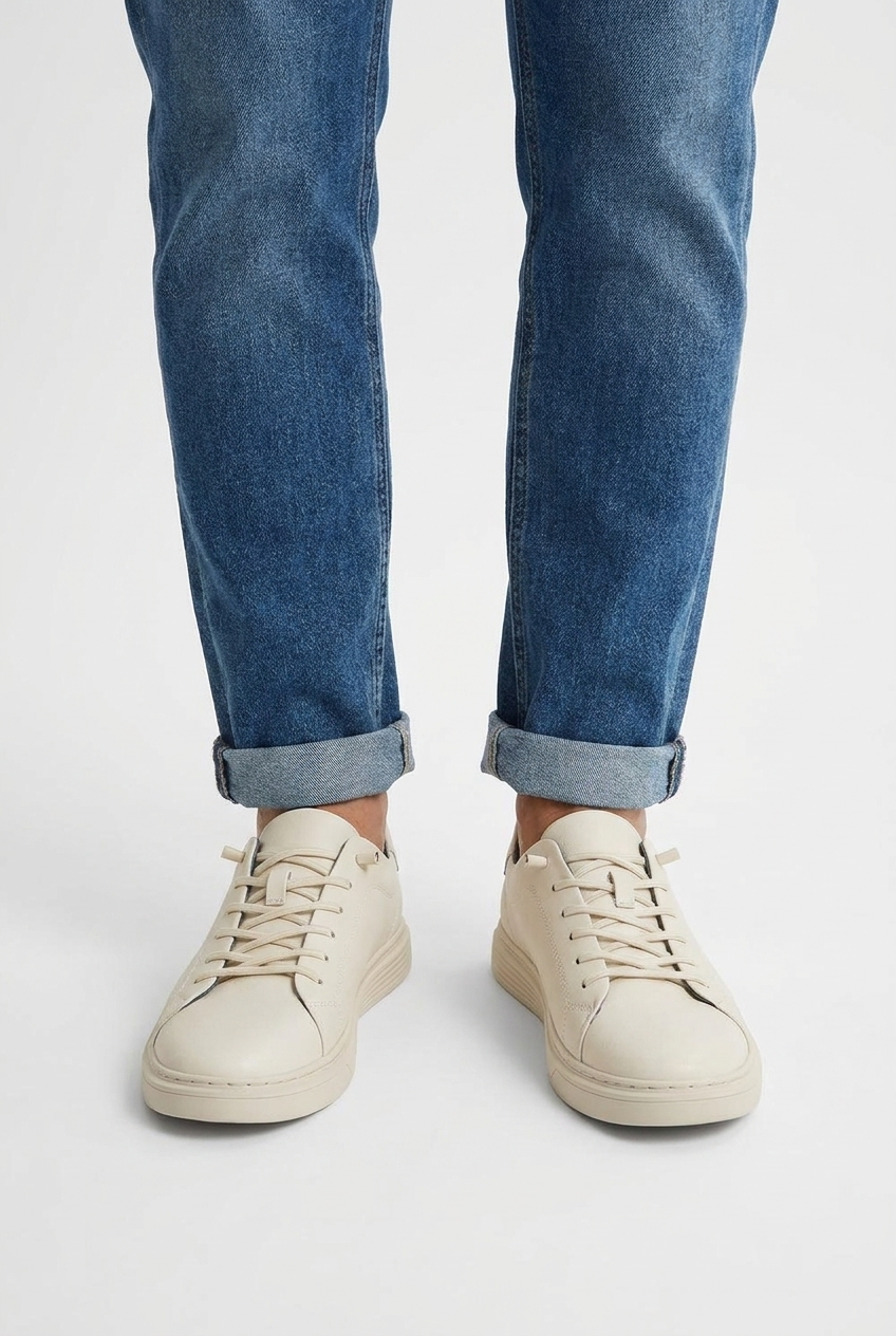 Carter men's minimalist leather-look low-top trainers in off white, closeup view