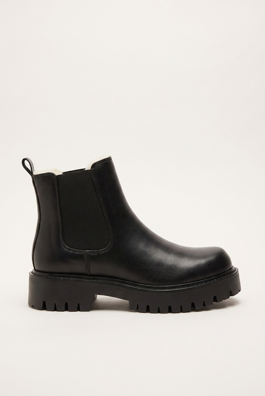 Monty men's chunky platform Chelsea boots in black side profile
