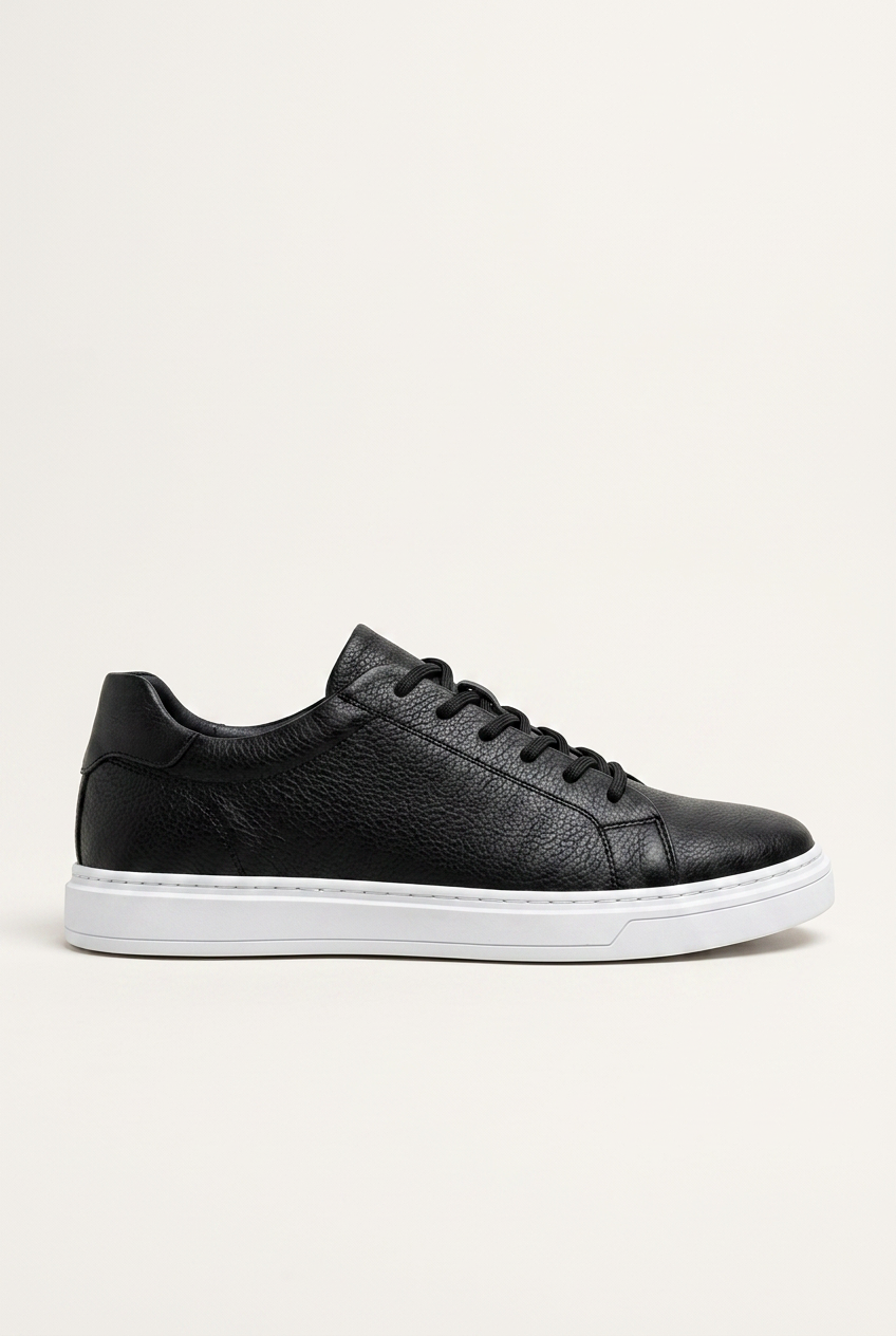 Carter men's minimalist leather-look low-top trainers in black side profile