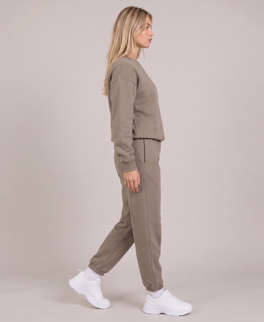 Khaki crew neck sweatshirt and joggers set side view on model
