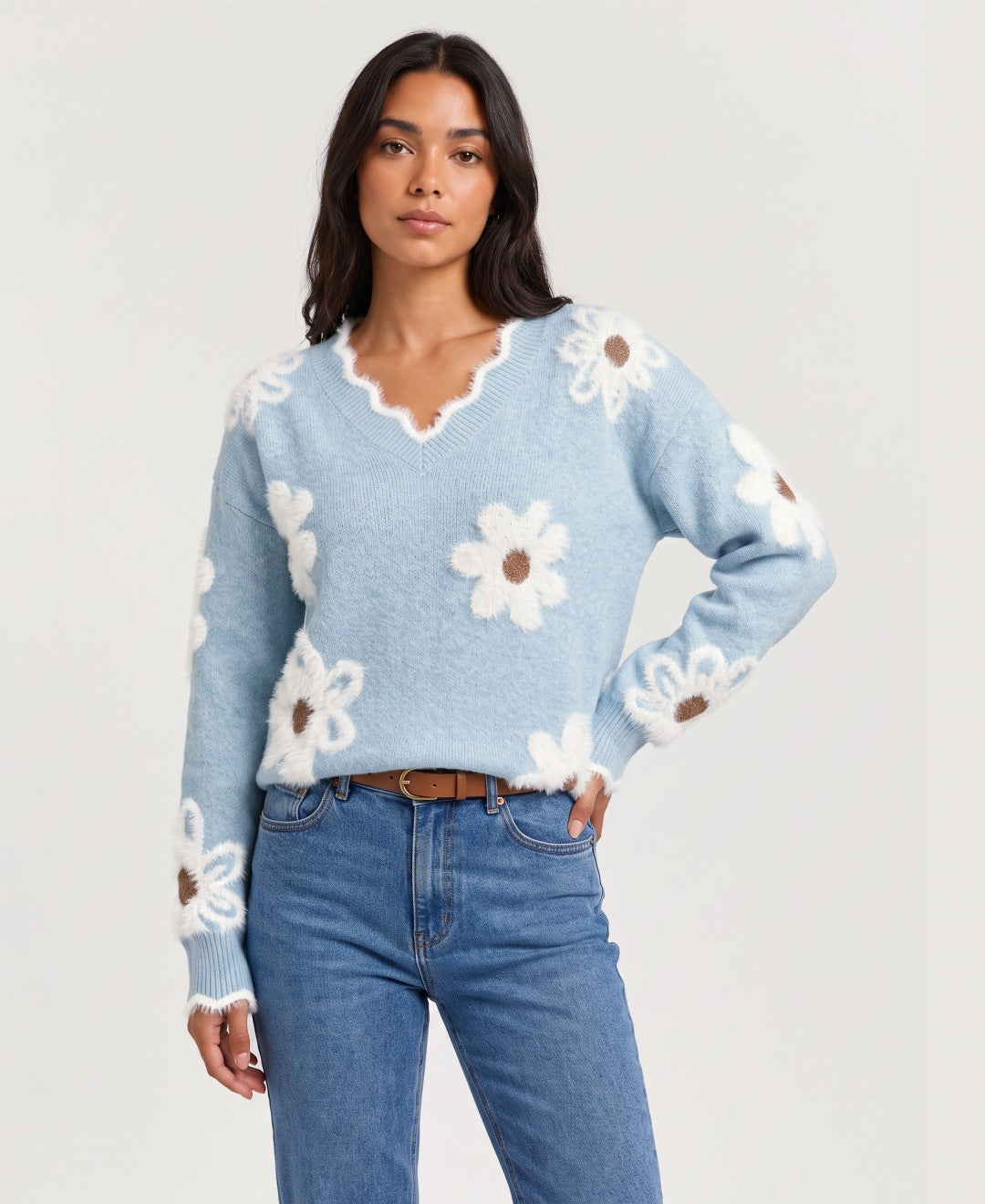 Women's V neck jumper with 3D daisy appliques in light blue, front view