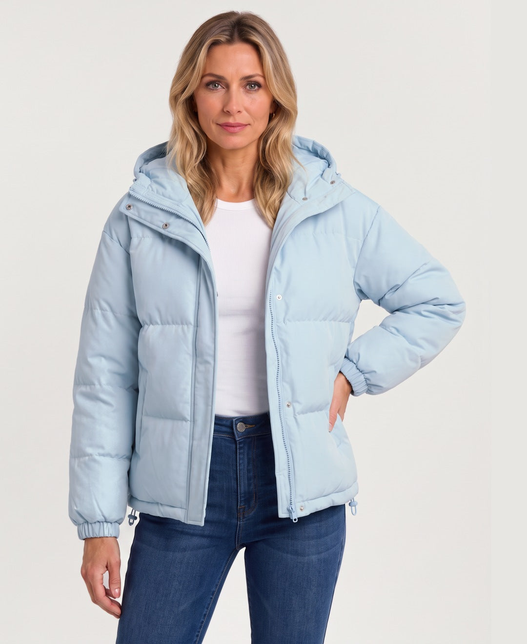 Women's short hooded puffer jacket light blue front view