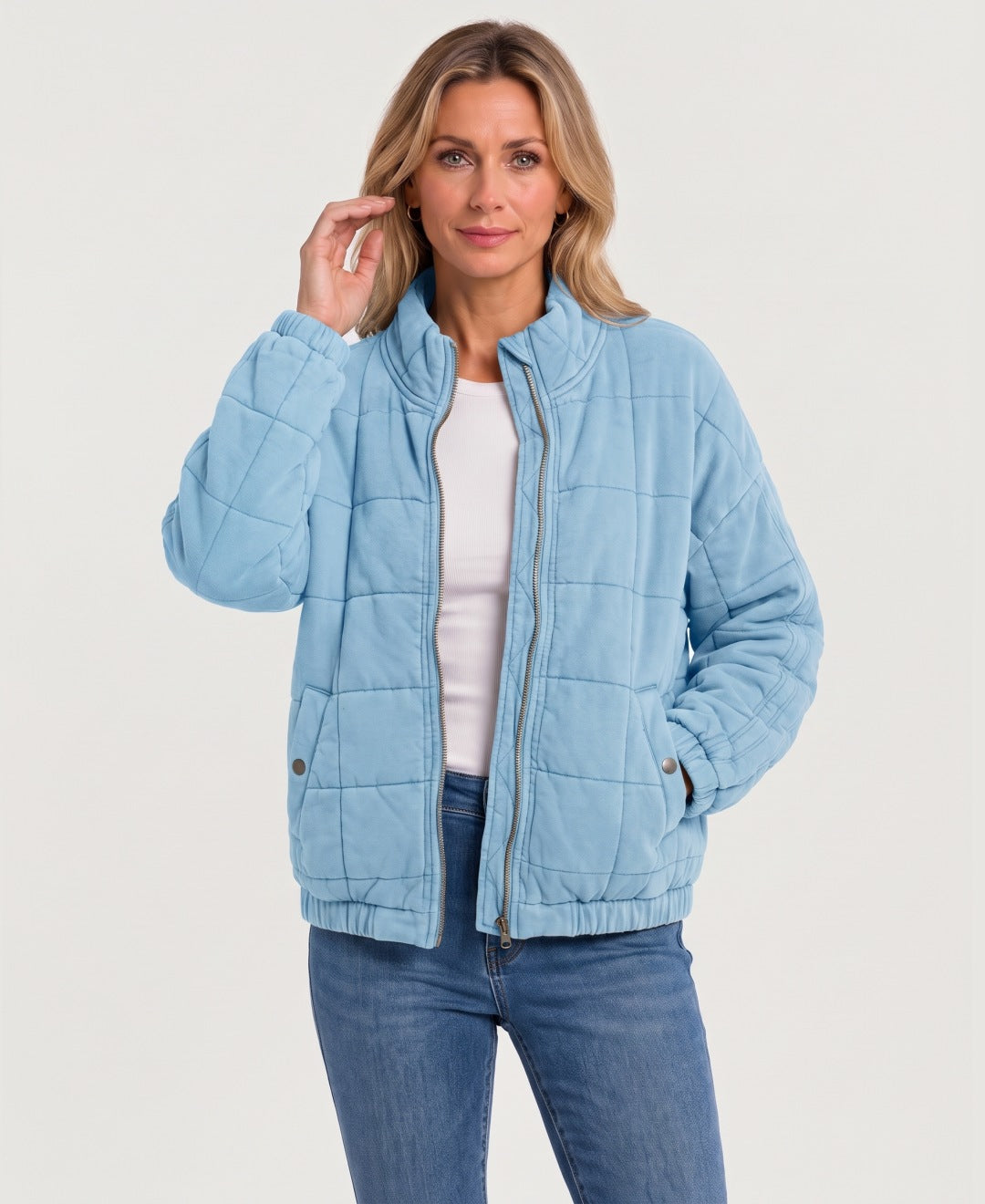 Women's quilted zip-up jacket light blue front view