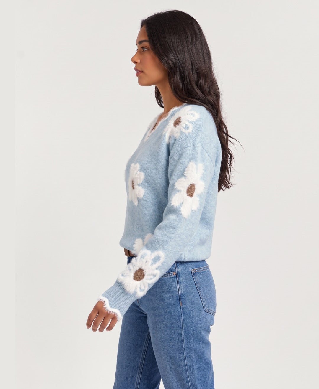 Women's V neck jumper with 3D daisy appliques in light blue, side view