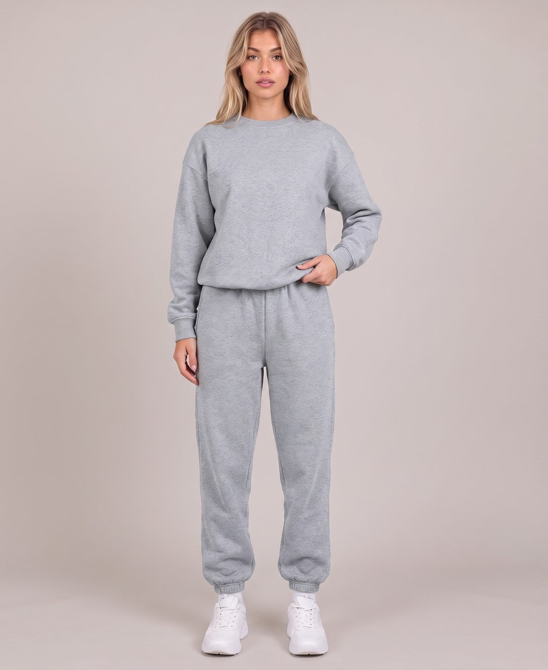 Light grey crew neck sweatshirt and joggers set front view on model