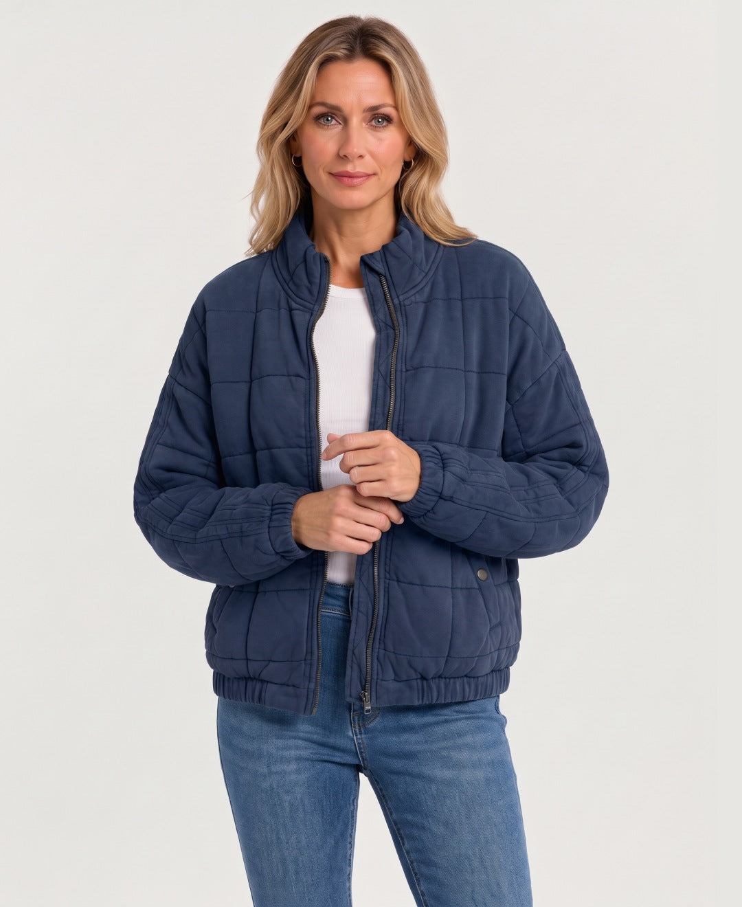 Women's quilted zip-up jacket navy front view