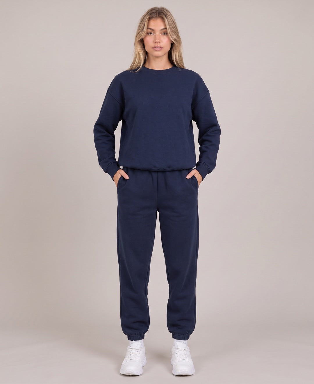 Navy crew neck sweatshirt and joggers set front view on model