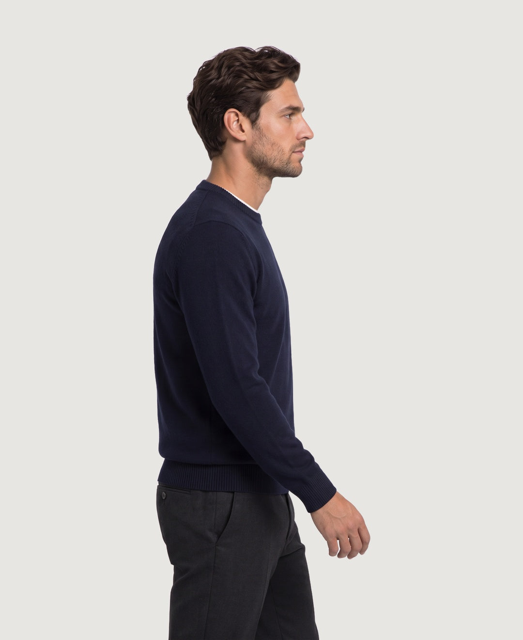 Men's soft knit crew neck jumper in navy, side view