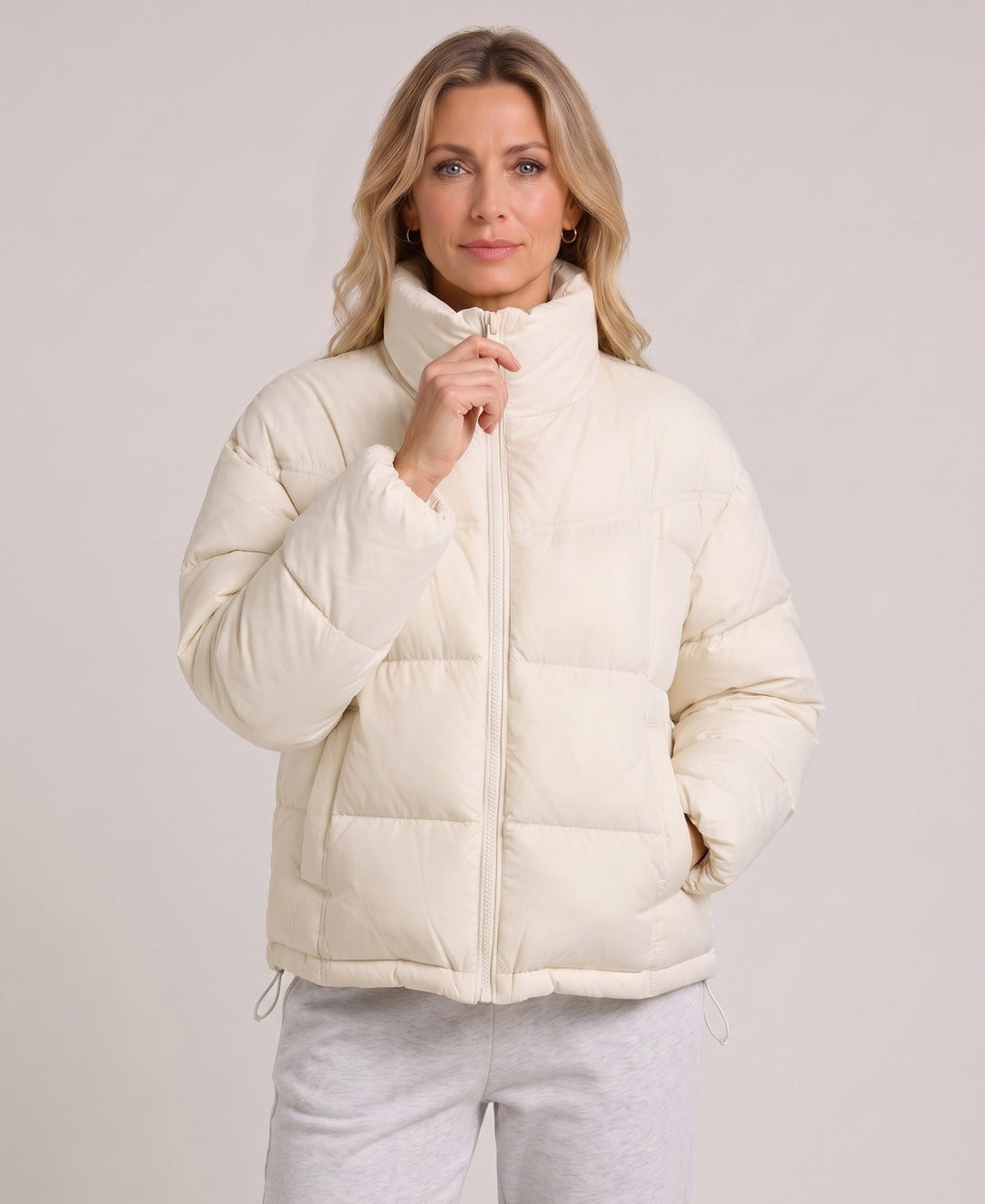 Women's Short Puffer Jacket Stand Collar Zip Front Drawstring Hem in Off-White, front view
